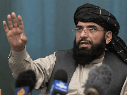 In this March 19, 2021 file photo, Suhail Shaheen, Afghan Taliban spokesman and a member of the negotiation team gestures while speaking during a joint news conference in Moscow, Russia. In an interview with The Associated Press Thursday, July 22, 2021, Shaheen said the insurgent movement does not want to …