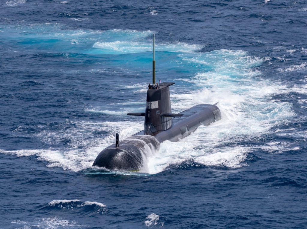 Submarine HMAS Rankin sails on the surface in the waters north of Darwin during AUSINDEX 21.
