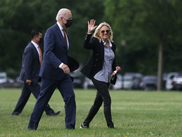 WASHINGTON, DC - JUNE 04: U.S. President Joe Biden (L) and first lady Dr. Jill Biden (R) walk on the Ellipse, south of the White House, after they departed Marine One June 4, 2021 in Washington, DC. President Biden and the first lady have returned from spending two nights at …