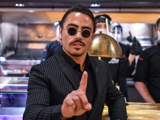 Turkish restaurateur Nusret Gokce, also known as 'Salt Bae', poses for photos at his restaurant 'Nusr-Et' at the Grand Bazaar after its reopening on June 1, 2020 in Istanbul. - Turkey reopened restaurants, cafes and Istanbul's iconic 15th century Grand Bazaar market on June 1 as the government further eased …
