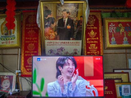 FILE - In this June 4, 2021, file photo, a television shows a broadcast of a Chinese talk