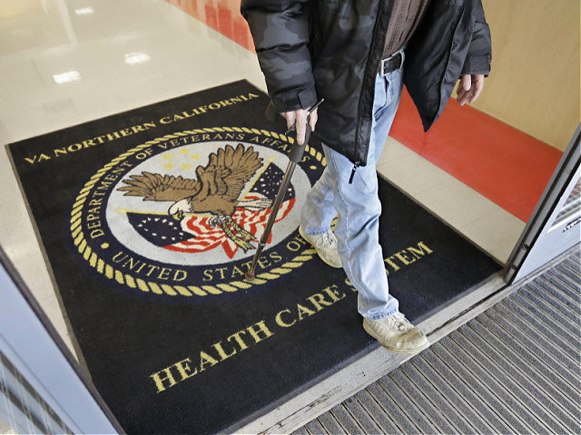 FILE - In this April 2, 2015, file photo, a visitor leaves the Sacramento Veterans Affairs