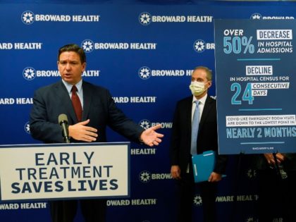 Florida Gov. Ron DeSantis, left, speaks at a news conference alongside Broward Health CEO Shane Strum, Thursday, Sept. 16, 2021, at the Broward Health Medical Center in Fort Lauderdale, Fla. DeSantis was there to promote the use of monoclonal antibody treatments for those infected with COVID-19. (AP Photo/Wilfredo Lee)