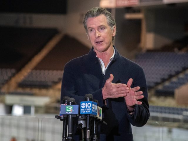 California Governor Gavin Newsom speaks at a press conference after touring the Stockton V