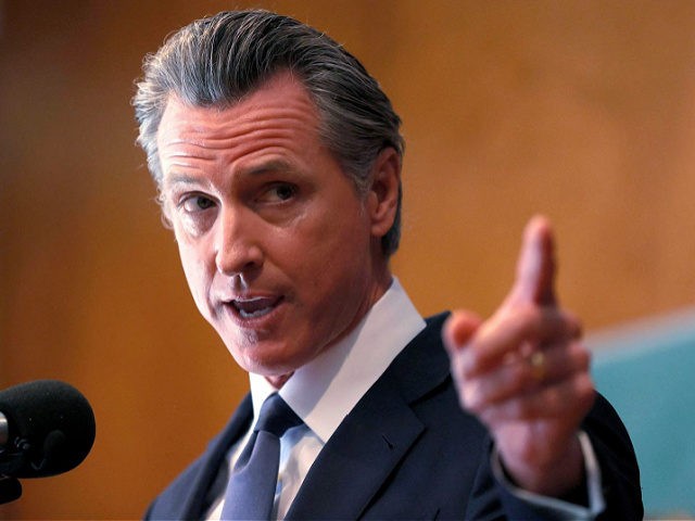 SAN FRANCISCO, CALIFORNIA - SEPTEMBER 14: California Gov. Gavin Newsom speaks to union workers and volunteers on election day at the IBEW Local 6 union hall on September 14, 2021 in San Francisco, California. Californians are heading to the polls to cast their ballots in the California recall election of …