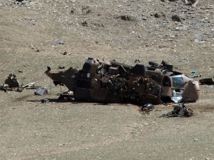A view of the site of a NATO helicopter crash on the outskirts of Wardak city on March 23, 2010 in Wardak province, Afghanistan. A NATO helicopter crashed south of the Afghan capital Kabul injuring two people. Reports claim that the aircraft failure was due to technical difficulties upon landing …