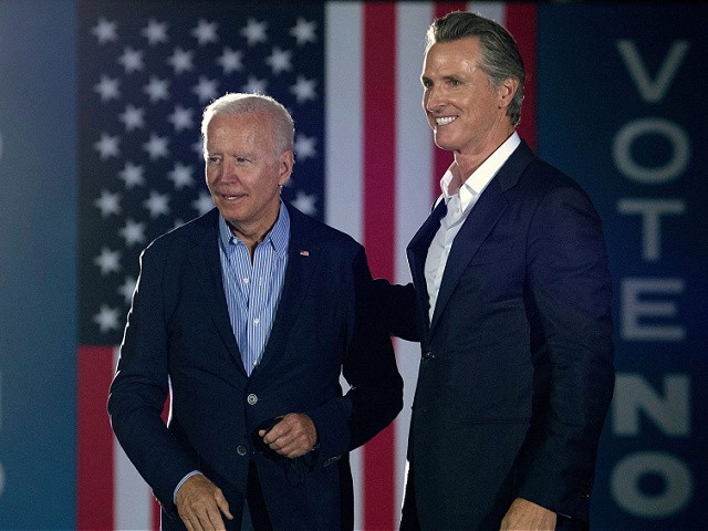California Governor Gavin Newsom (L) greets US President Joe Biden during a campaign event at Long Beach City Collage in Long Beach, California on September 13, 2021. - US President Joe Biden kicked off a visit to scorched western states Monday to hammer home his case on climate change and big public investments, as well as to campaign in California's recall election. (Photo by Brendan Smialowski / AFP) (Photo by BRENDAN SMIALOWSKI/AFP via Getty Images)