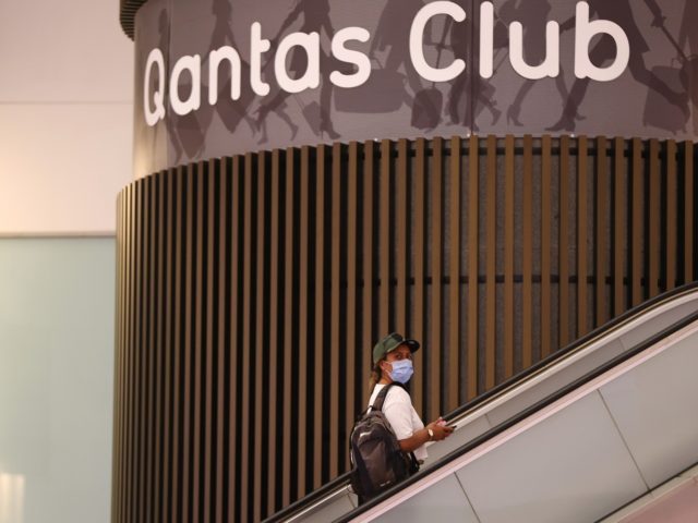 PERTH, AUSTRALIA - JANUARY 14: A passenger catches the elevator to the Qantas Club wearing