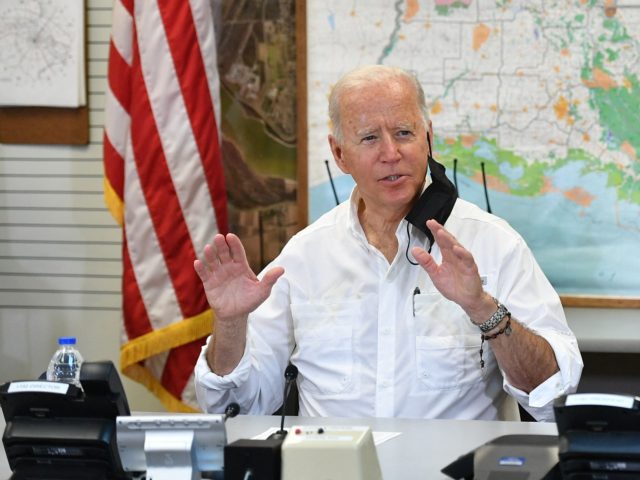 US President Joe Biden takes part in a briefing with local leaders on the impact of Hurric