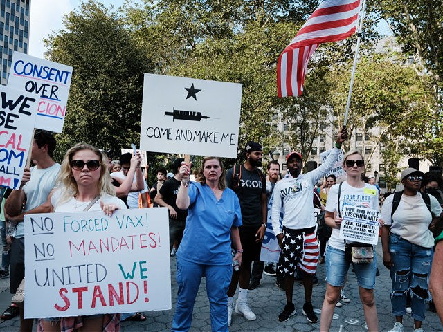 NEW YORK, NEW YORK - SEPTEMBER 13: People participate in a rally and march against COVID-19 mandates on September 13, 2021 in New York City. President Joe Biden has supported and ordered mandates for federal workers as a growing movement has emerged of Americans against both the vaccine and the …