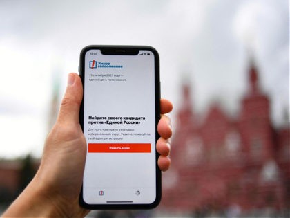 An illustration picture shows a smartphone screen displaying the "Smart Voting" - jailed Kremlin critic Alexei Navalny's app that aims to help Russians to vote out candidates from the ruling United Russia party in the upcoming polls, in Moscow on September 16, 2021. - President Vladimir Putin on September 16, …