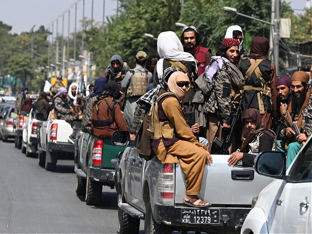 A convoy of Taliban fighters patrol along a street in Kabul on September 2, 2021. (Photo by Aamir QURESHI / AFP) (Photo by AAMIR QURESHI/AFP via Getty Images)