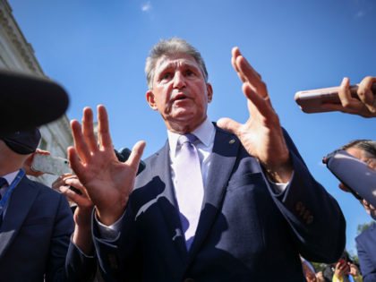 WASHINGTON, DC - SEPTEMBER 30: Sen. Joe Manchin (D-WV) speaks to reporters outside of the U.S. Capitol on September 30, 2021 in Washington, DC. The Senate is expected to pass a short term spending bill to avoid a government shutdown. (Photo by Kevin Dietsch/Getty Images)