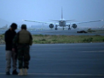 A Qatar Airways aircraft bound to Qatar prepares to take off at the airport in Kabul on Se
