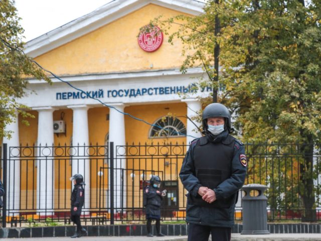 Police officers patrols the building of the Perm State National Research University campus