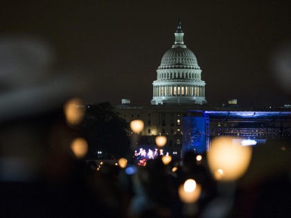 WASHINGTON, DC - MAY 13: The U.S. Capitol Building is pictured during a candlelight vigil marking National Police Week on May 13, 2018 in Washington, D.C. (Photo by Zach Gibson/Getty Images)