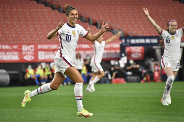 Forward Carli Lloyd celebrates the first of her five goals in the United States' 9-0 victo