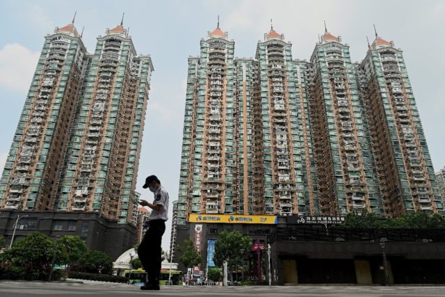 Chinese property developer Evergrande has admitted facing 'tremendous pressure' as it tack