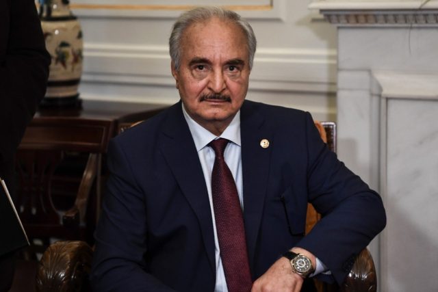 Libyan strongman Khalifa Haftar sits during talks in Athens on January 17, 2020