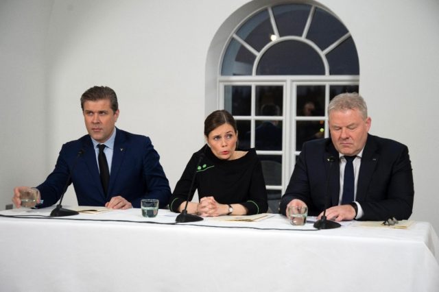 Iceland's Prime Minister Katrin Jakobsdottir and rival Bjarni Benediktsson, pictured left,