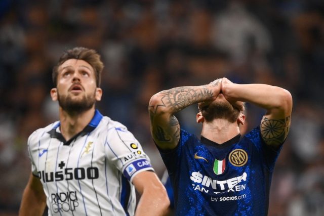 Federico Dimarco (R) missed the penalty that would have handed Inter Milan victory over At