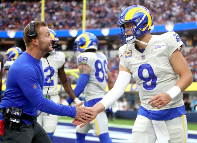 Los Angeles Rams head coach Sean McVay congratulates quarterback Matthew Stafford during t