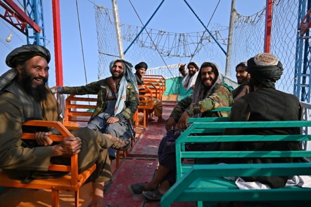 Taliban fighters were in a playful mood in the capital they seized less than six weeks ago
