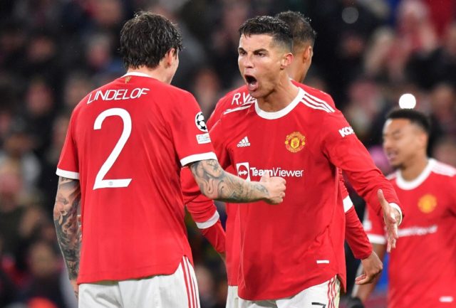 Cristiano Ronaldo (centre) scored a 95th minute winner to earn Manchester United a 2-1 win