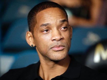 Actor Will Smith waits for the start of the Floyd Mayweather-Marcos Maidana boxing bout Saturday, Sept. 13, 2014, in Las Vegas. (AP Photo/John Locher)