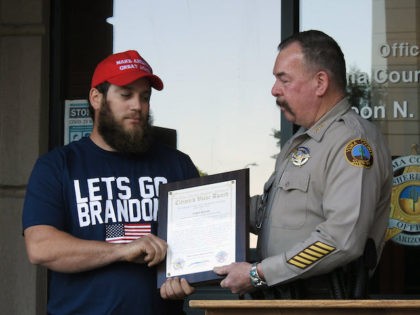 Sheriff Leon Wilmot presents Citizen’s Valor Award to Yuma resident James Kilcer. (Yuma