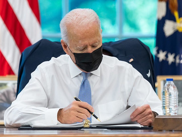 President Joe Biden looks over his notes in the Oval Office of the White House Thursday, July 29, 2021, prior to signing the Dispose Unused Medications and Prescription Opioids Act and the Major Medial Facility Authorization Act of 2021. (Official White House Photo by Adam Schultz)