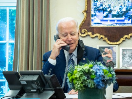 President Joe Biden talks on the phone with Senator Rob Portman, D-Ohio, following the Senate vote to pass the $1.2 trillion infrastructure bill,Tuesday, August 10, 2021, in the Oval Office Dining Room of the White House. (Official White House Photo by Adam Schultz)
