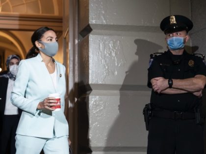 Rep. Alexandria Ocasio-Cortez (D-NY) arrives for a House Democratic Caucus meeting with Pr