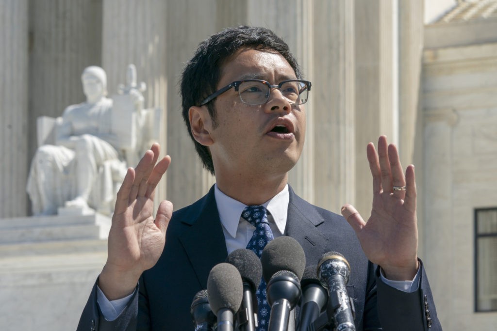 Dale Ho, an attorney for the American Civil Liberties Union, speaks to reporters after he argued before the Supreme Court against the Trump administration's plan to ask about citizenship on the 2020 census, in Washington, Tuesday, April 23, 2019. Critics say adding the question would discourage many immigrants from being counted, leading to an inaccurate count. (AP Photo/J. Scott Applewhite)