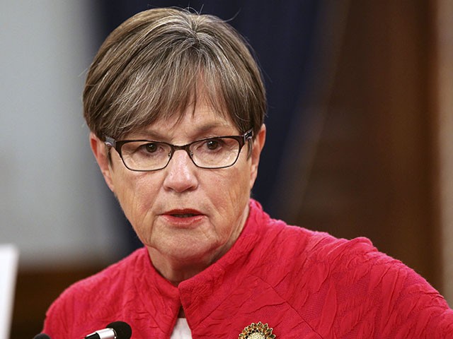 Kansas Gov. Laura Kelly speaks to reporters during a news conference, Wednesday, July 28, 2021, at the Statehouse in Topeka, Kan. Kelly is imposing a mask mandate for state government workers and visitors to state buildings in most of Kansas' 105 counties. (AP Photo/John Hanna)
