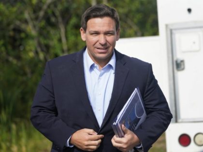 FILE - In this Tuesday, Aug. 3, 2021, file photo, Florida Gov. Ron DeSantis arrives at a n