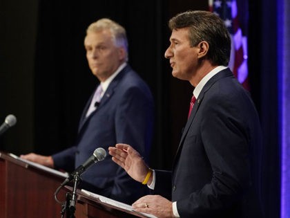 Republican gubernatorial candidate Glenn Youngkin, right, gestures as Democratic gubernatorial candidate former Governor Terry McAuliffe, left, listens during a debate at the Appalachian School of Law in Grundy, Va., Thursday, Sept. 16, 2021. (AP Photo/Steve Helber)