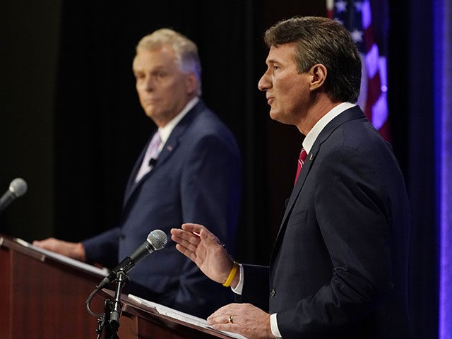 Republican gubernatorial candidate Glenn Youngkin, right, gestures as Democratic gubernatorial candidate former Governor Terry McAuliffe, left, listens during a debate at the Appalachian School of Law in Grundy, Va., Thursday, Sept. 16, 2021. (AP Photo/Steve Helber)