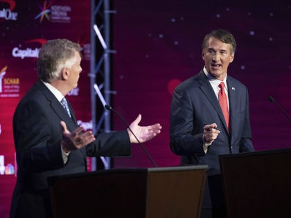 Virginia Democratic gubernatorial candidate and former Gov. Terry McAuliffe, left, and Republican challenger, Glenn Youngkin, participate in their debate at Northern Virginia Community College, in Alexandria, Va., Tuesday, Sept. 28, 2021. (AP Photo/Cliff Owen)