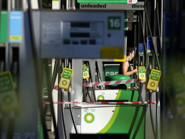 Petrol pumps out of use at a petrol station in London, Wednesday, Sept. 29, 2021. Prime Mi