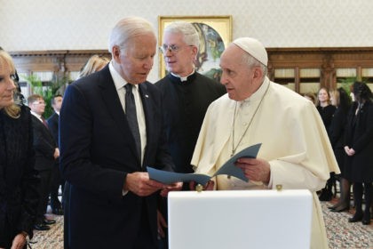 US President Joe Biden, left, exchanges gifts with Pope Francis as they meet at the Vatican, Friday, Oct. 29, 2021. President Joe Biden is set to meet with Pope Francis on Friday at the Vatican, where the world’s two most notable Roman Catholics plan to discuss the COVID-19 pandemic, climate …