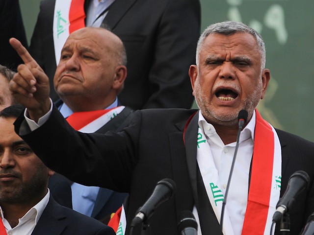 Hadi al-Amiri, head of the Iranian-backed Badr Organization and leader of the Fateh Alliance, a coalition of Iranian-supported militia groups, speaks during a campaign rally in Baghdad on May 7, 2018, ahead of Iraq's parliamentary elections to be held on May 12. (Ahmad Al-Rubaye/AFP via Getty Images)