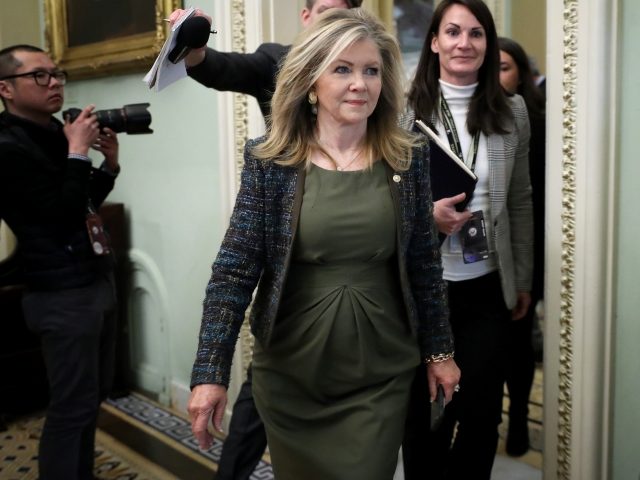 WASHINGTON, DC - JANUARY 21: Sen. Marsha Blackburn (R-TN) quickly walks past reporters as she arrives for the weekly Senate Republican policy luncheon at the U.S. Capitol January 21, 2020 in Washington, DC. Senators will vote Tuesday on the rules for President Donald Trump's impeachment trial, which is expected to …