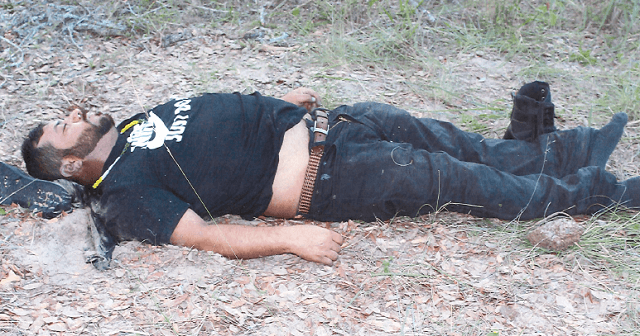 Brooks County deputies recover the body of a migrant who died just minutes before being found by Border Patrol agents. (Photo: Brooks County Sheriff's Office)