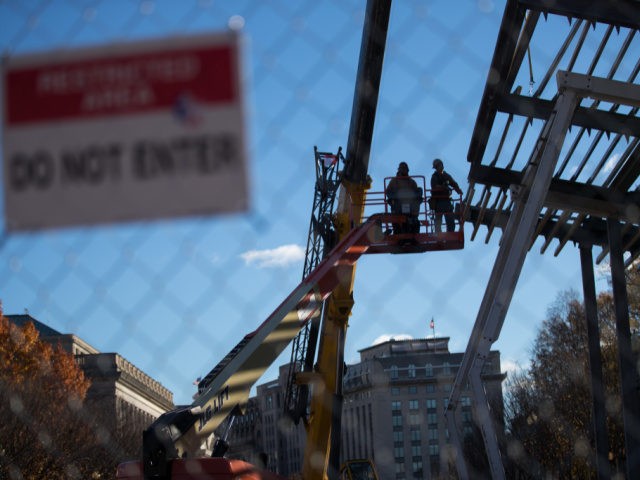 WASHINGTON, DC - NOVEMBER 21: Workers assemble metal beams to form the structure of the in
