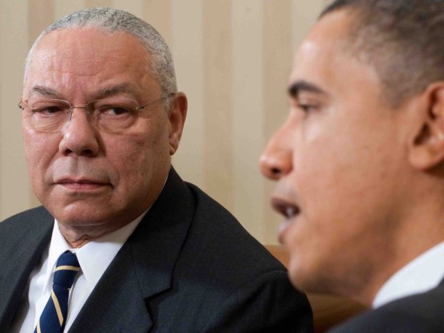 Colin Powell and Barack Obama (Saul Loeb / AFP / Getty)