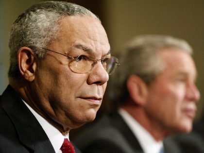 WASHINGTON, UNITED STATES: (FILES) This 04 November, 2004 file photo shows US Secretary of State Colin Powell (L) listening as US President George W. Bush (R) holds a meeting with his cabinet at the White House in Washington, DC. The State Department announced 15 November, 2004 that Powell resigned as …
