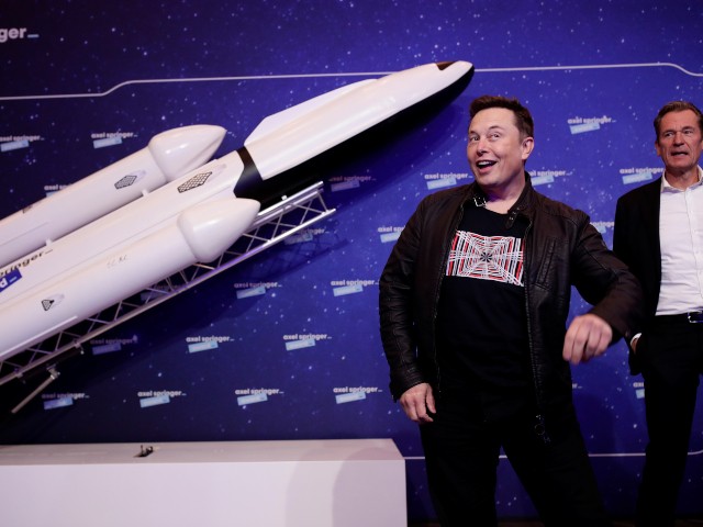 Elon Musk Looking Goofy Next to Rocket