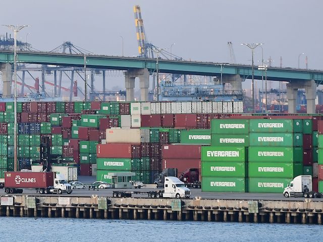 Containers stacked high are seen at the Port of Los Angeles on September 28, 2021, in Los
