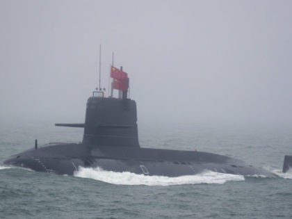 A Great Wall 236 submarine of the Chinese People's Liberation Army (PLA) Navy, billed by Chinese state media as a new type of conventional submarine, participates in a naval parade to commemorate the 70th anniversary of the founding of China's PLA Navy in the sea near Qingdao, in eastern China's …